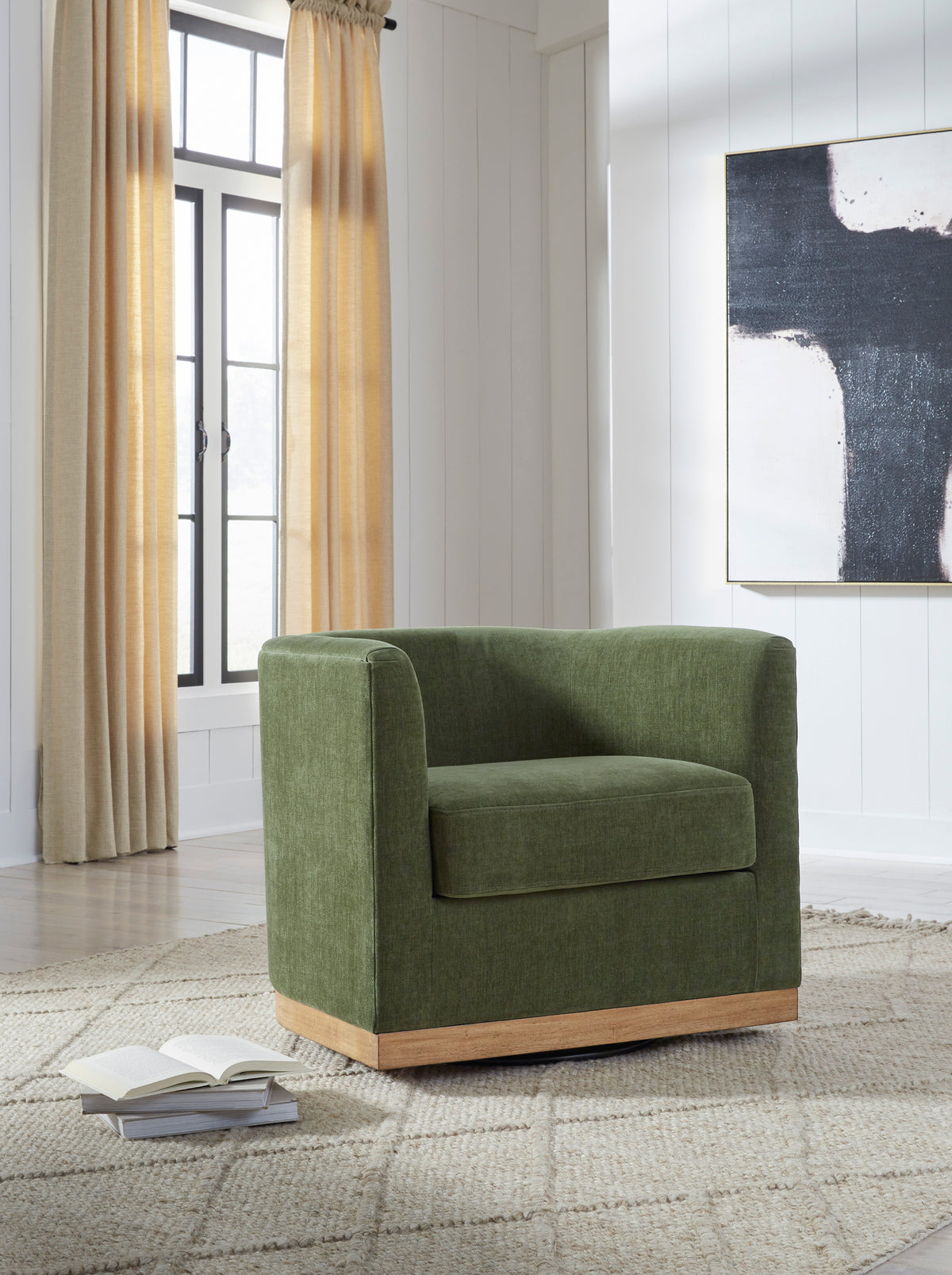 Ashley Jersonlow Swivel Accent Chair, in a styled room