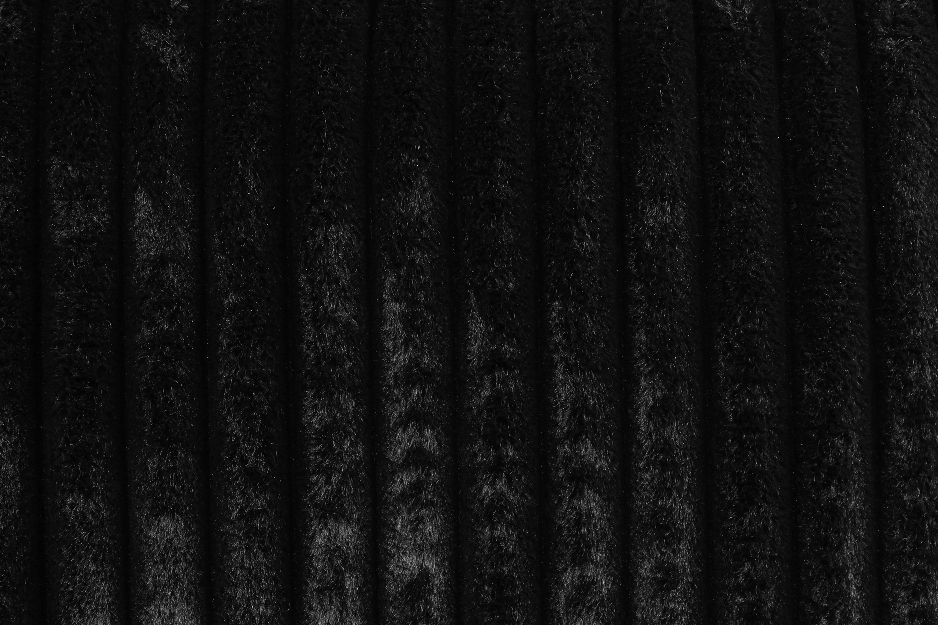 Midnight Haven Black Corduroy Sectional with Ottoman