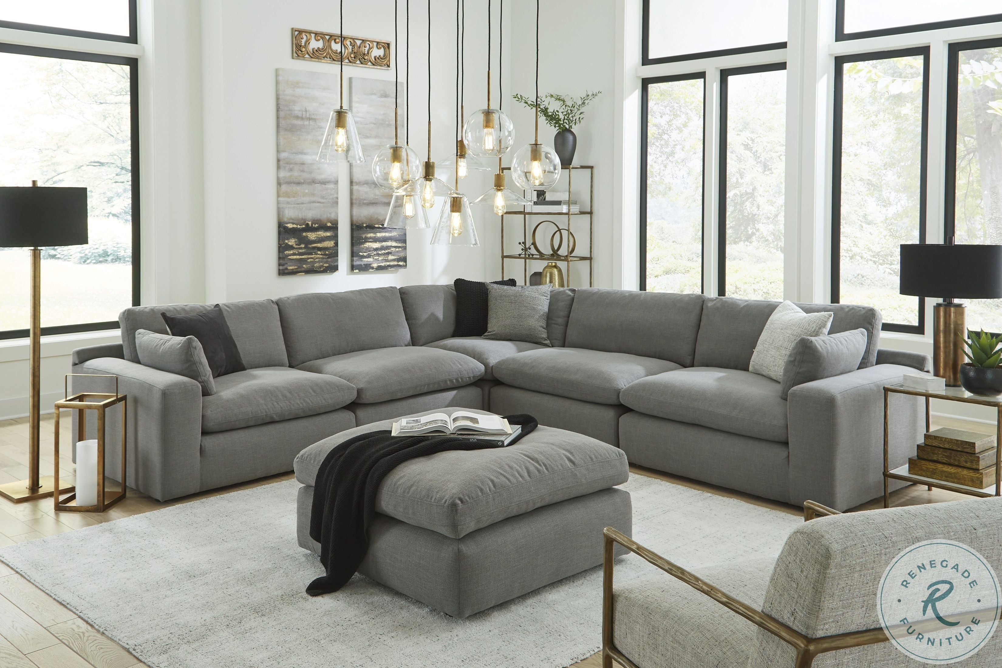 wide view of Elyza Smoke Oversized Ottoman in front of couch