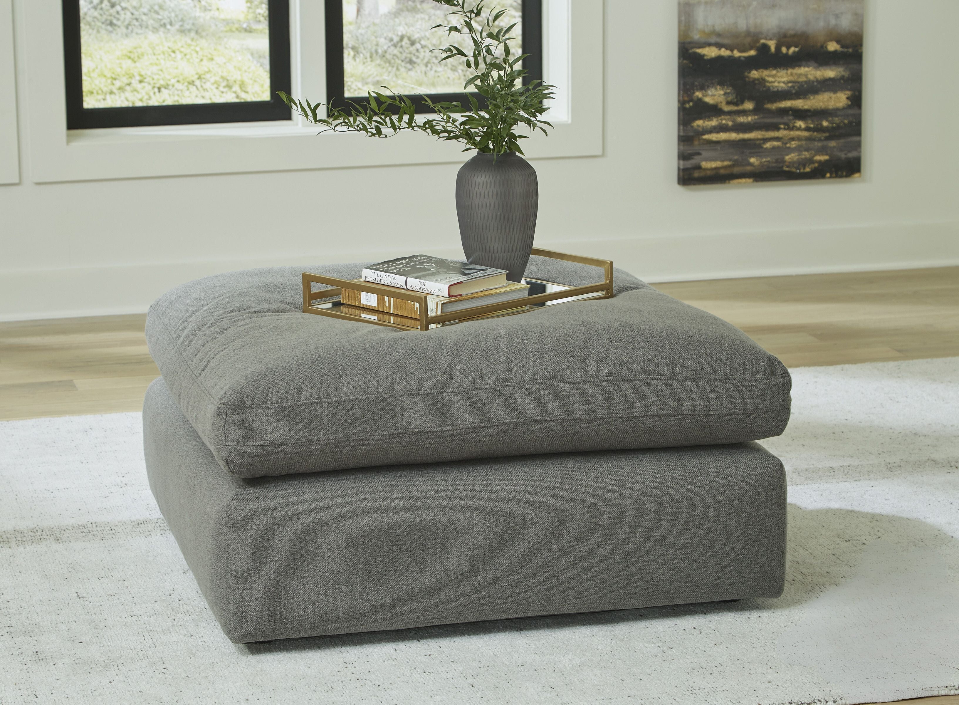 Elyza Smoke Oversized Ottoman with books on top