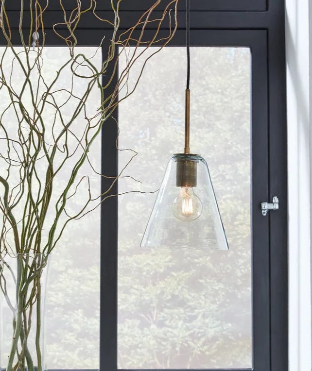 Collbrook Pendant Light in kitchen next to plant and apples