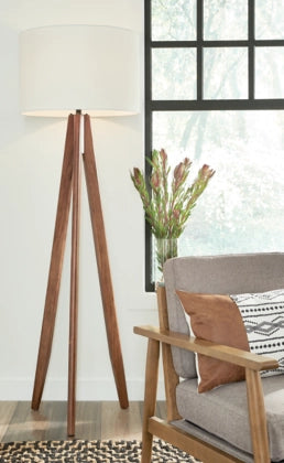 Dallson Floor Lamp in living room behind chair